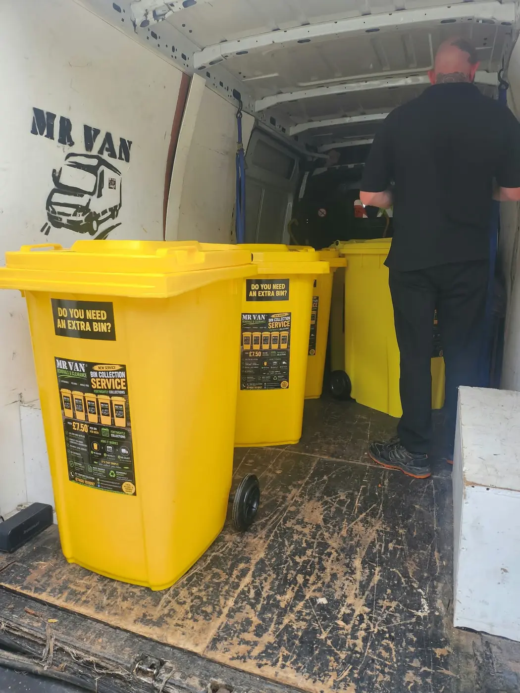 MR VAN yellow wheelie bins being delivered from the company van